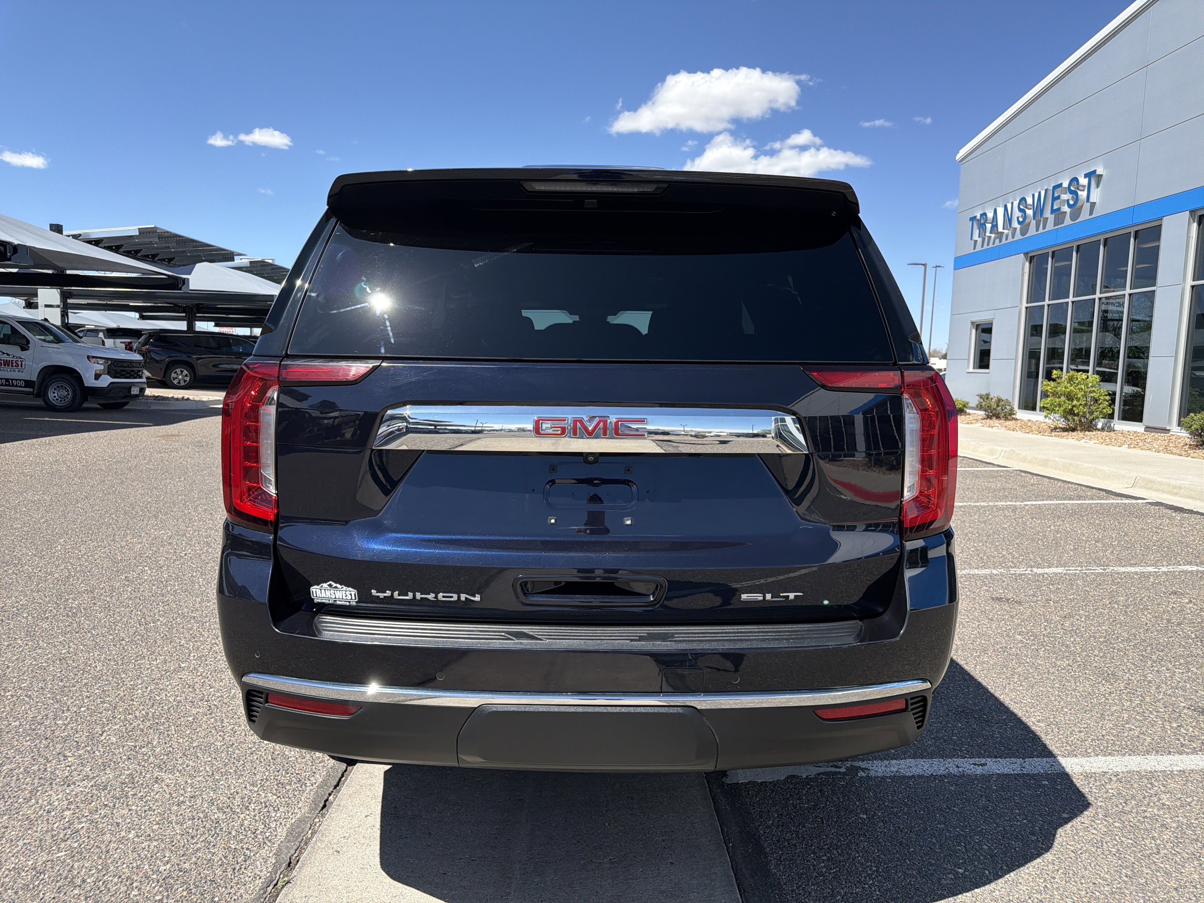 Used 2024 Midnight Blue Metallic GMC SLT image 4