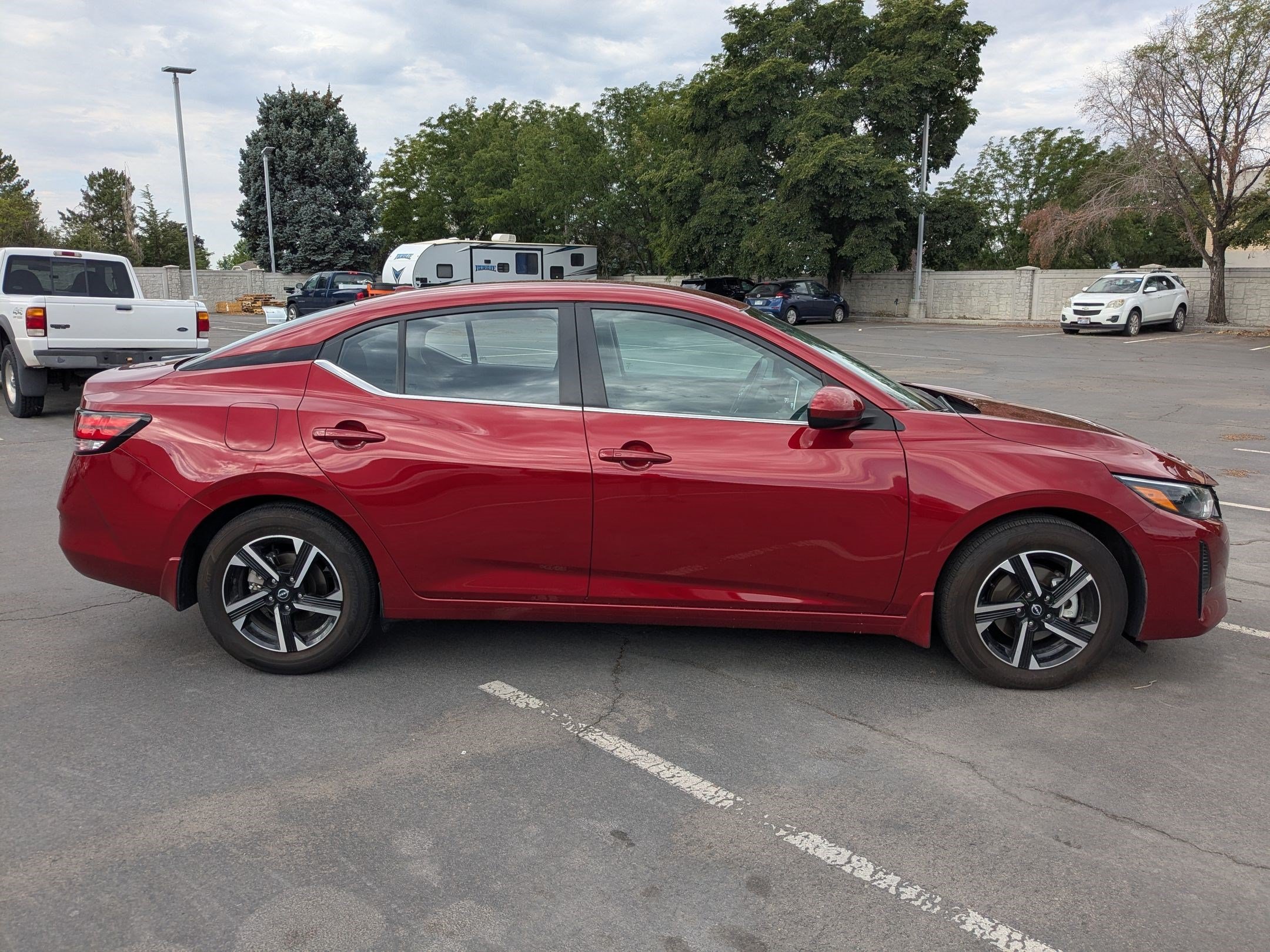 Used 2025 Scarlet Ember Tintcoat Nissan SV image 2