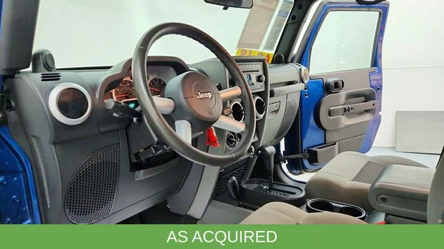Used 2010 Blue Jeep Unlimited Sahara image 18