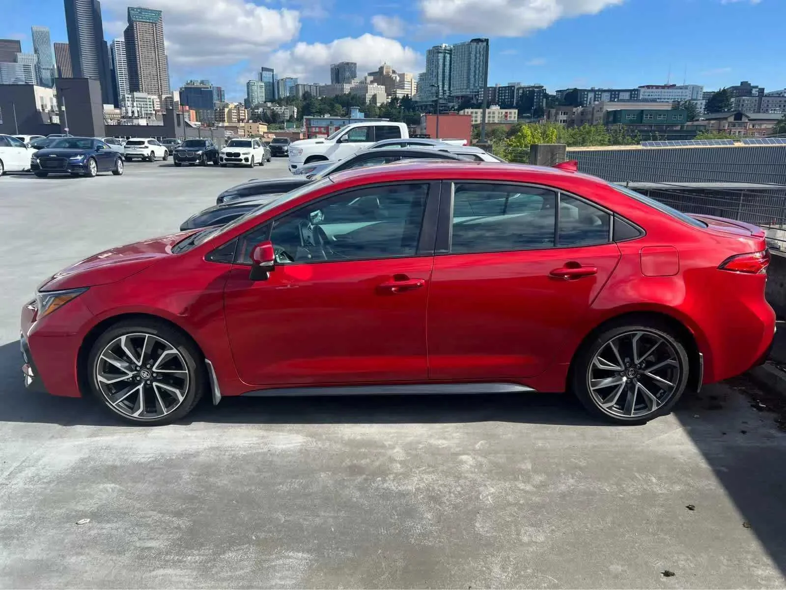 Used 2021 Barcelona Red Metallic Toyota SE image 1