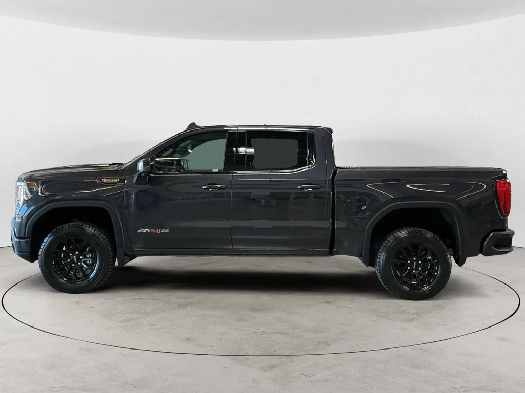 Used 2023 Titanium Rush Metallic GMC AT4X image 8