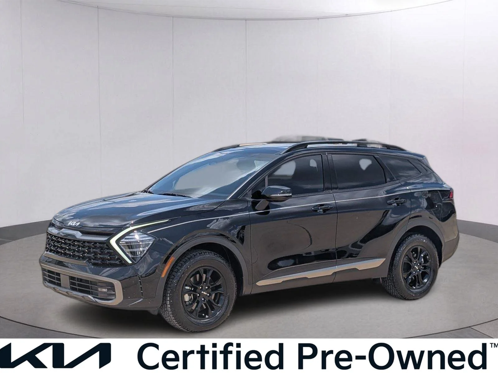 Used 2024 Ebony Black Kia X-Pro image 1