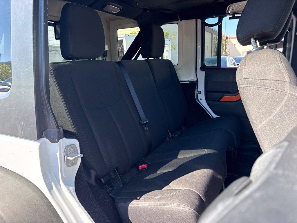 Used 2016 White Jeep Unlimited Sport image 17