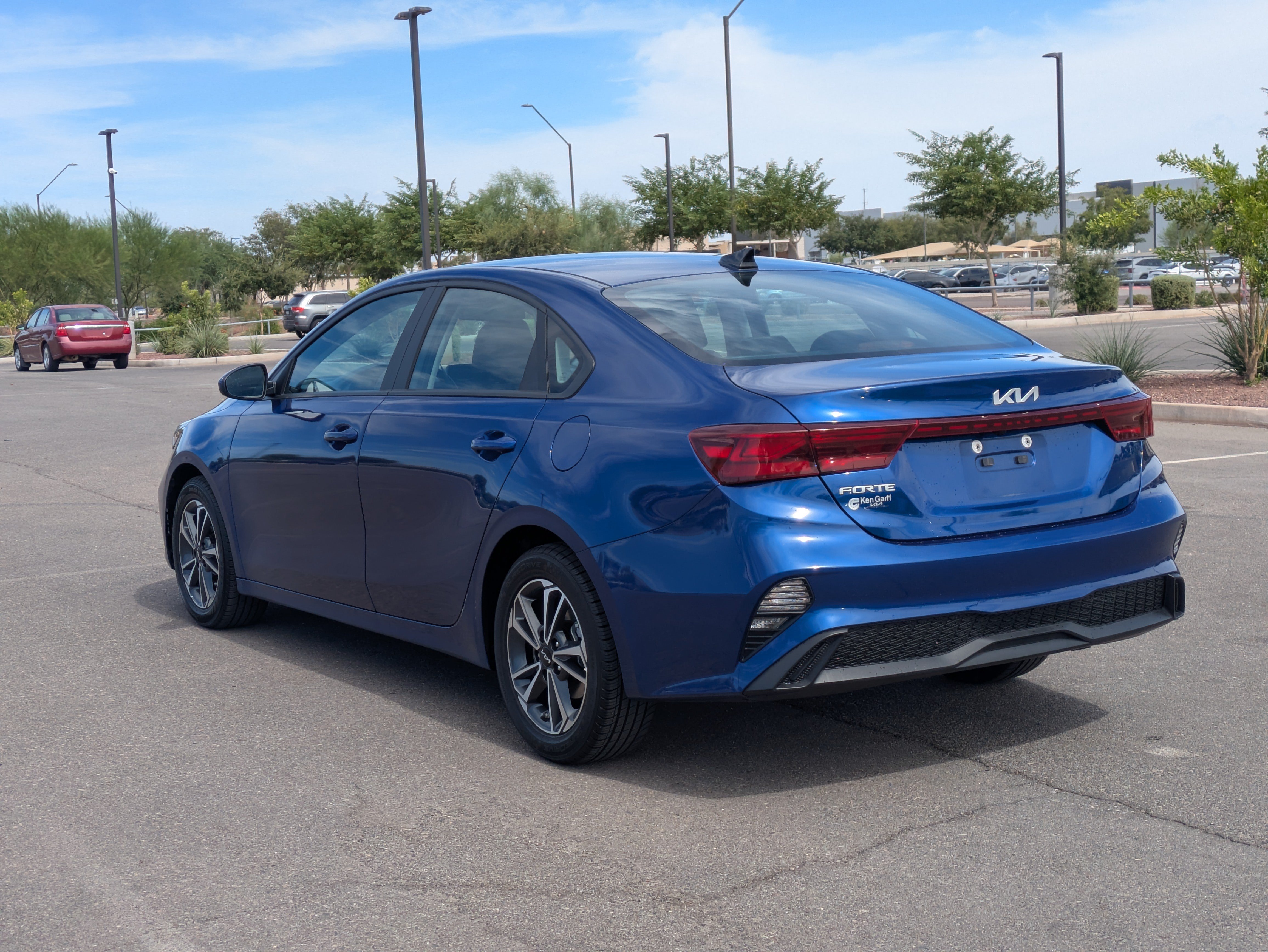 Used 2024 Deep Sea Blue Kia LXS image 3