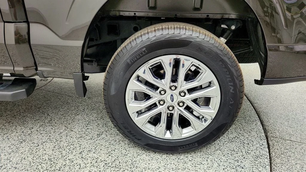 Used 2024 Darkened Bronze Metallic Ford XLT 4WD SuperCrew 5.5
