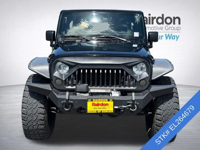 Used 2014 Black Clearcoat Jeep Unlimited Rubicon image 2