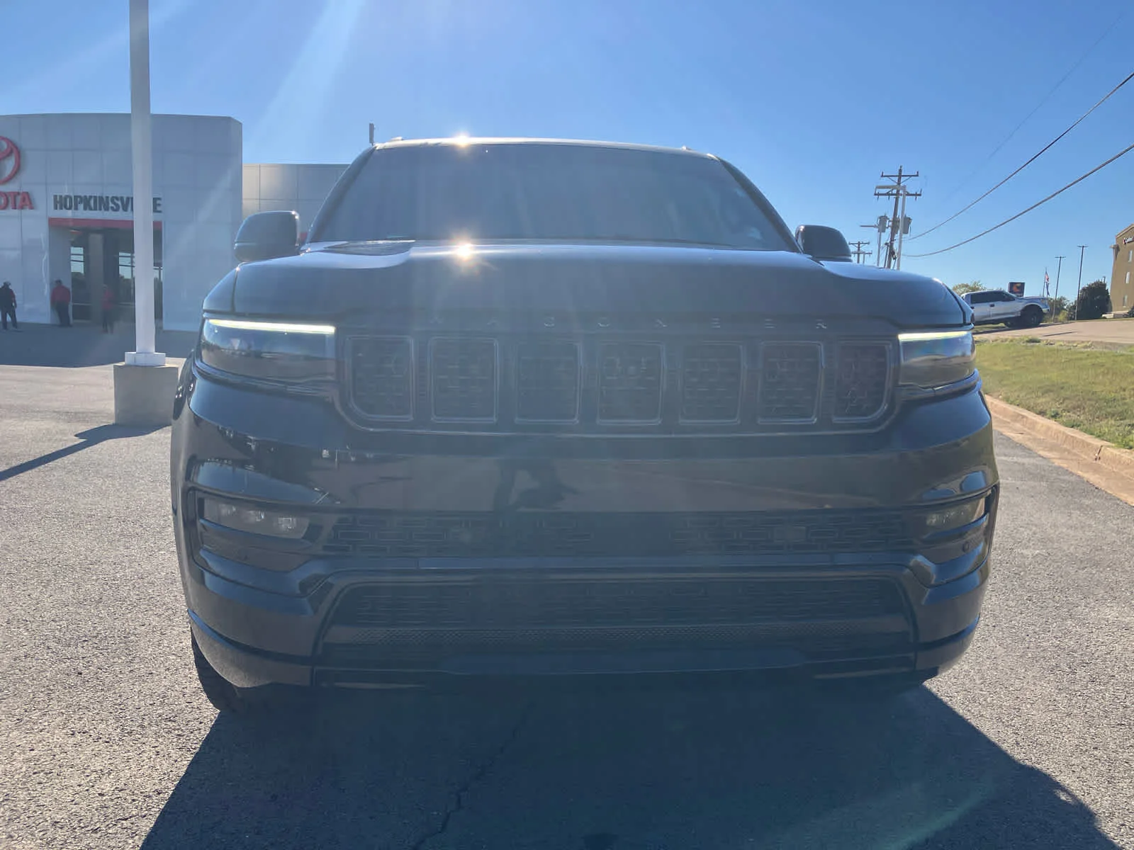 Used 2022 BRIGHT WHITE CL Jeep Series II Obsidian image 2