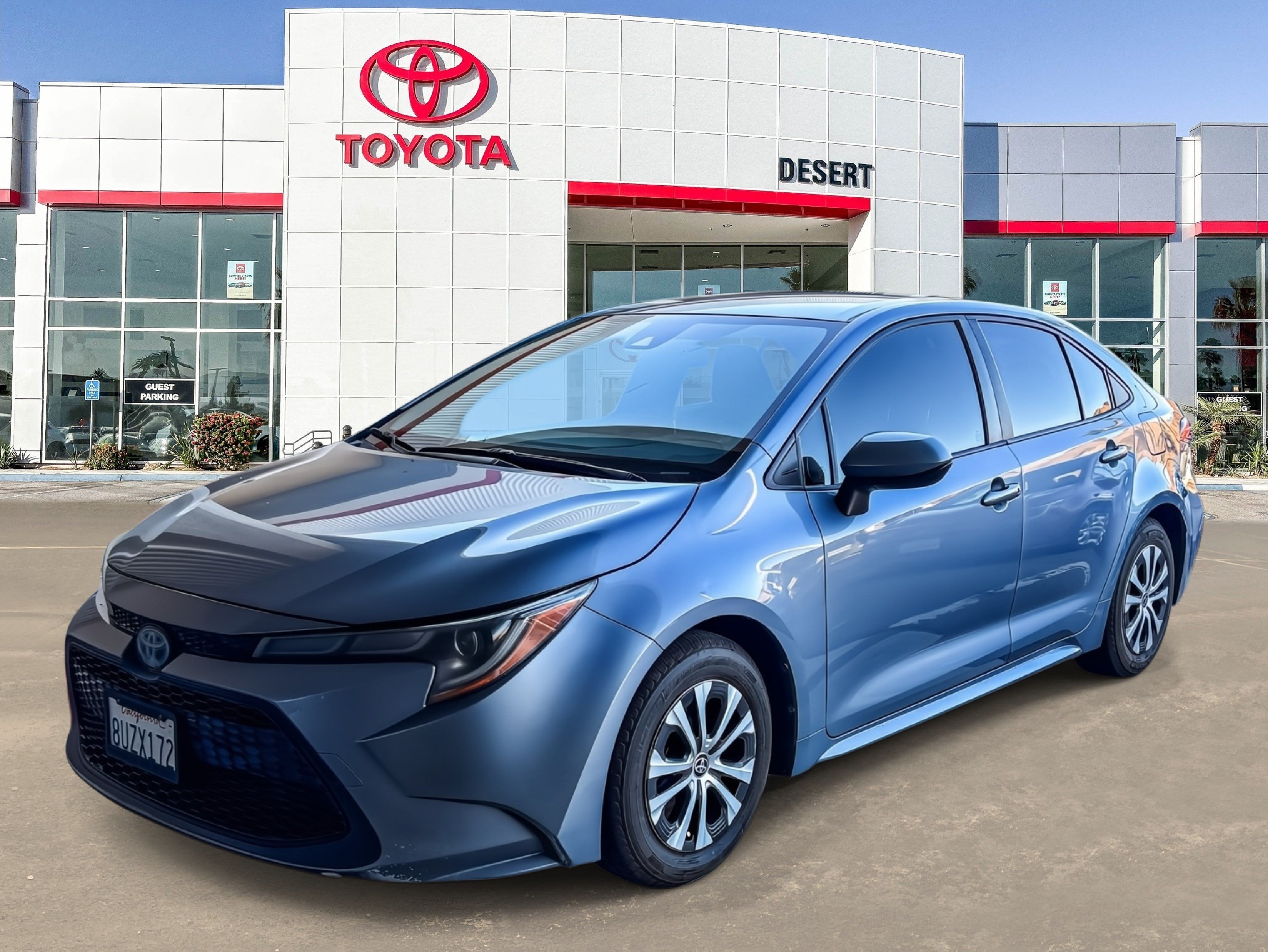 Used 2021 Super White Toyota Hybrid LE image 2