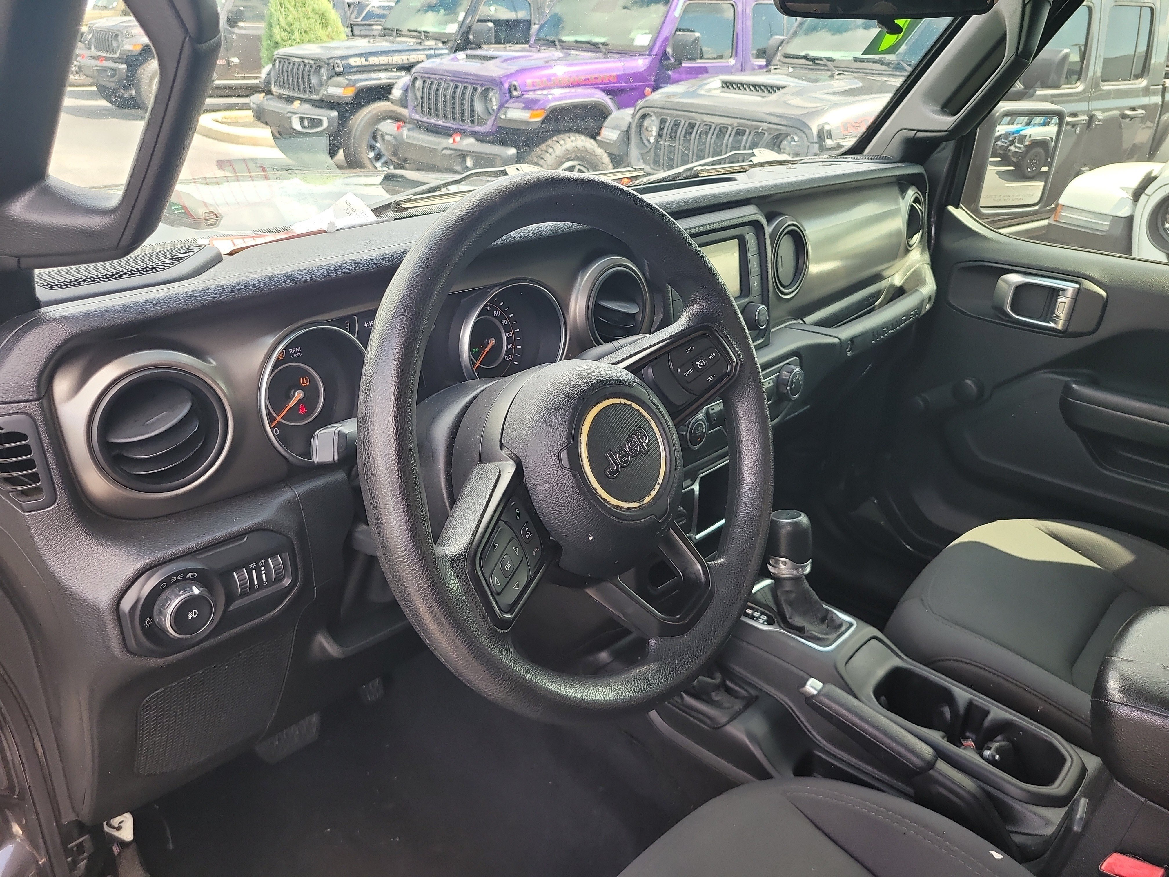 Used 2019 Granite Crystal Metallic Clearcoat Jeep Sport image 18