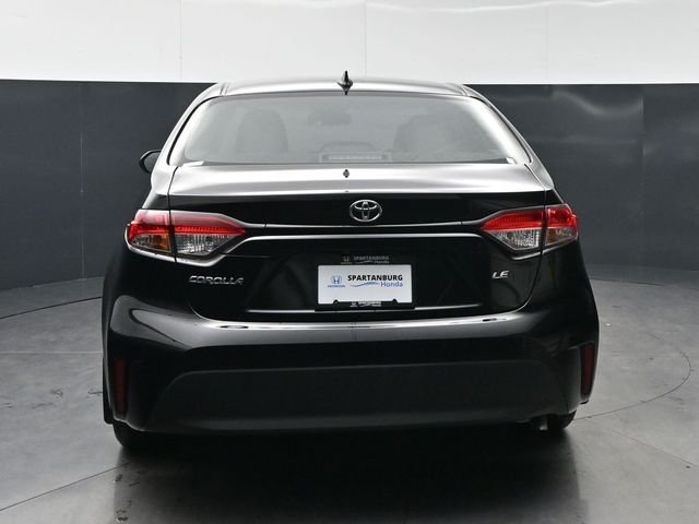 Used 2025 Midnight Black Metallic Toyota LE image 6