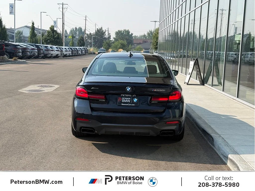 Used 2023 Black BMW M550i xDrive image 4
