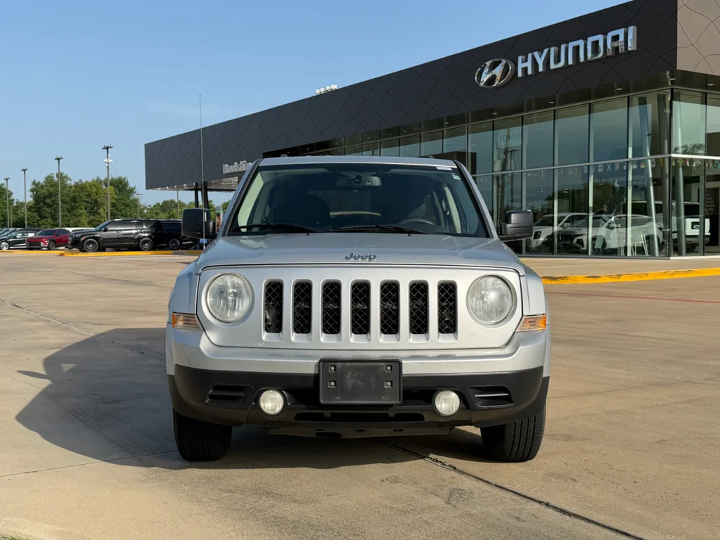 Used 2011 Bright Silver Metallic Clearcoat Jeep Sport image 9
