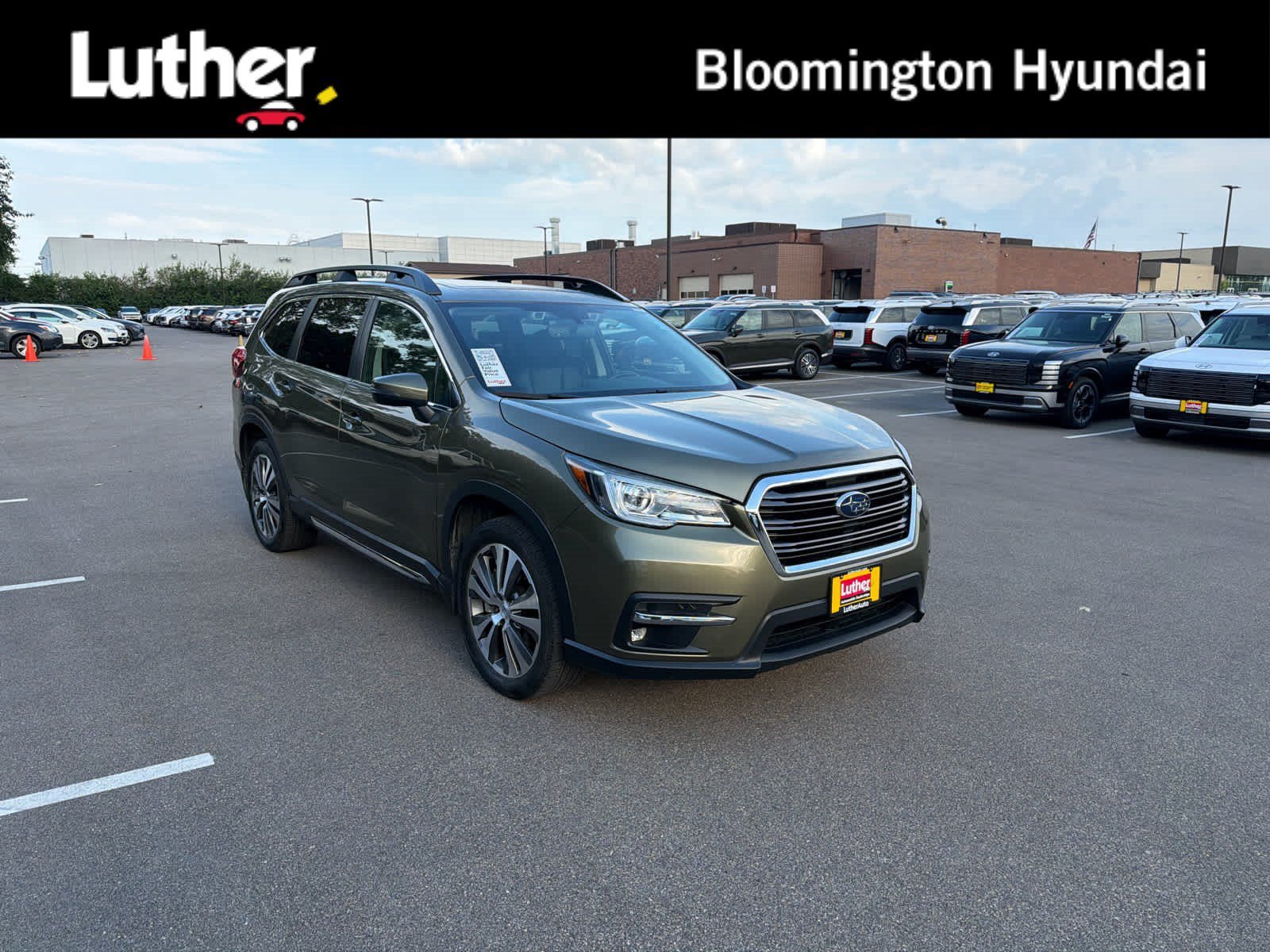 Used 2022 Autumn Green Metallic Subaru Limited image 1