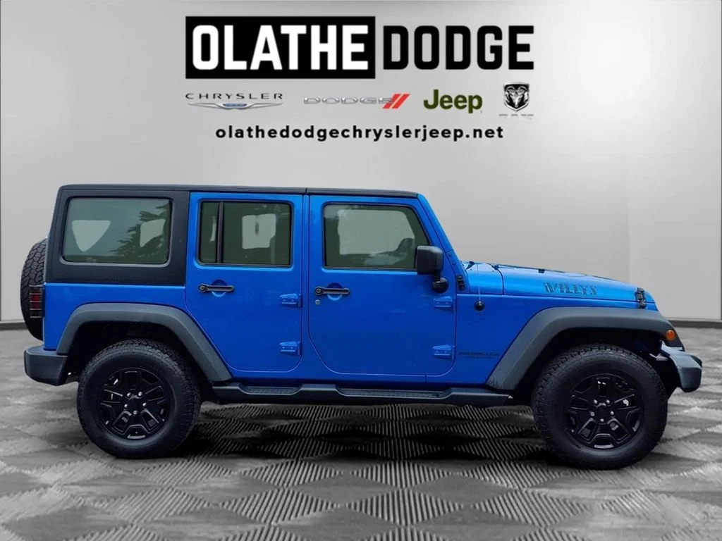 Used 2016 Blue Jeep Unlimited Sport image 28