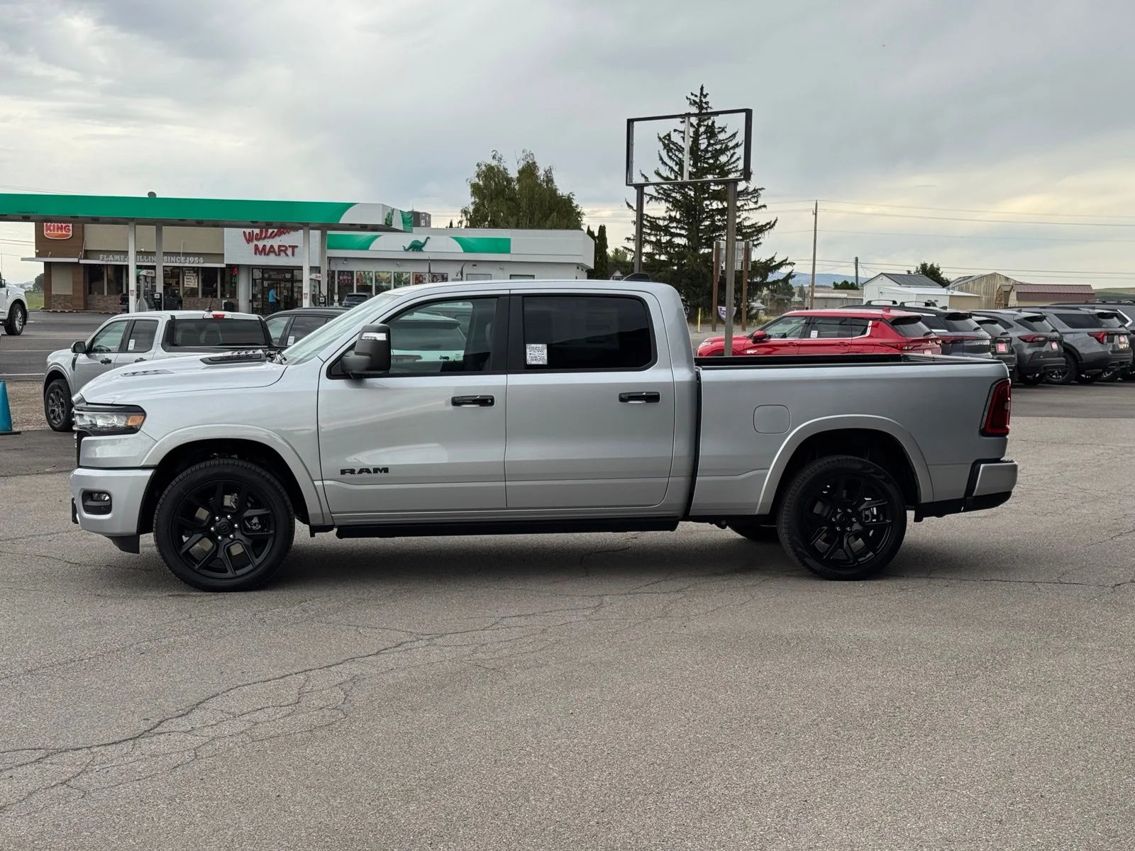 New 2026 Silver Zynith Exterior Paint RAM Laramie image 13