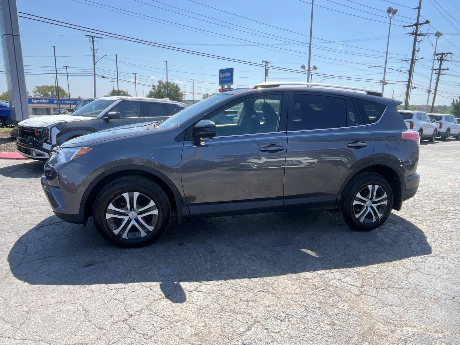 Used 2016 Magnetic Gray Metallic Toyota LE image 4