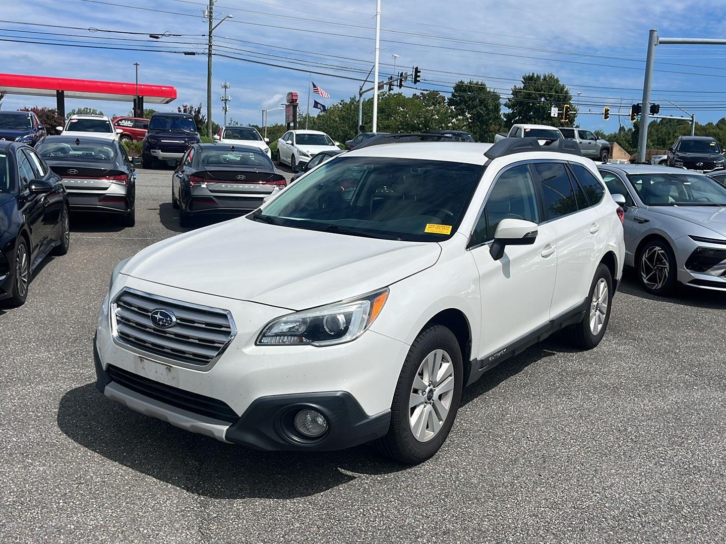 Used 2015 Crystal White Pearl Subaru 2.5i Premium image 1