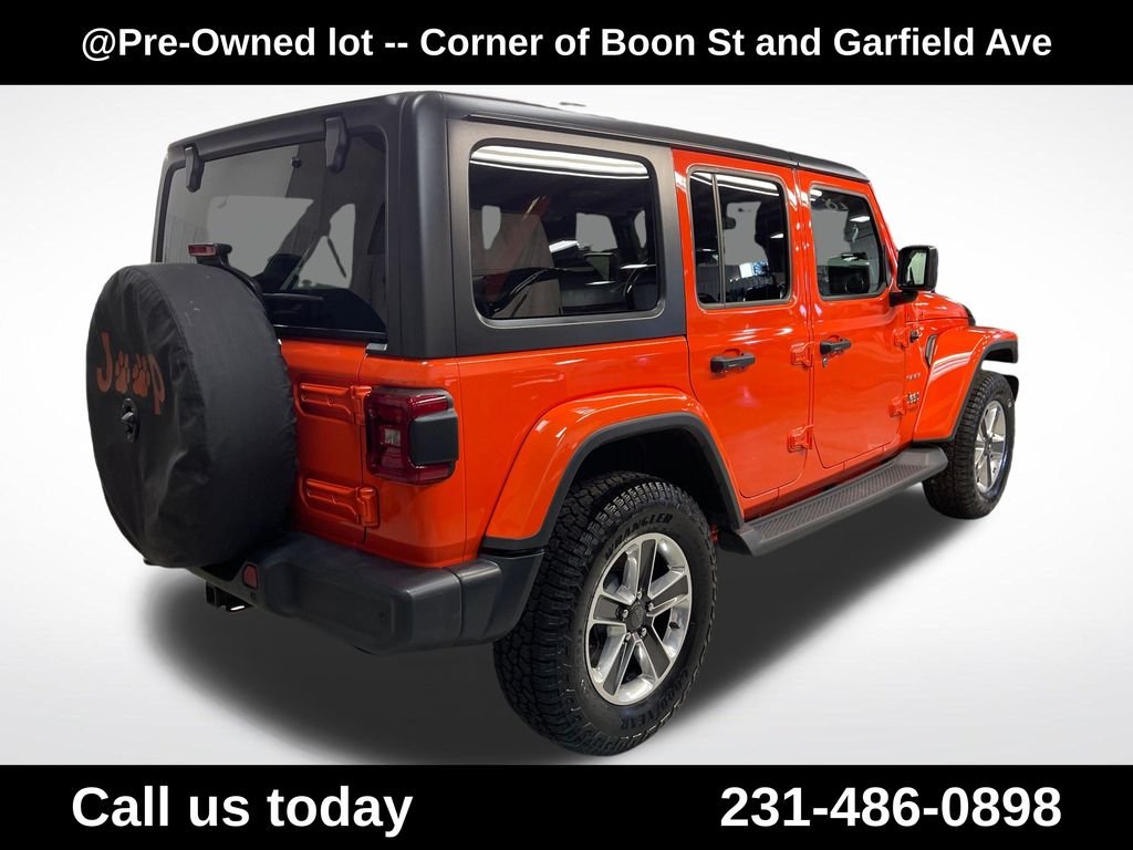 Used 2018 Orange Jeep Unlimited Sahara image 10
