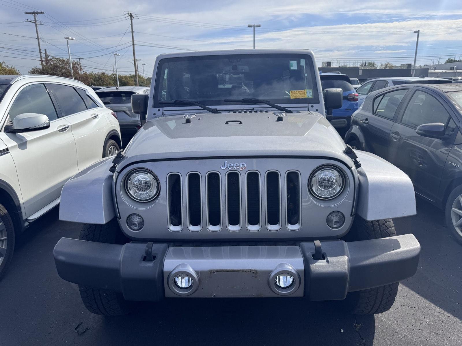 Used 2017 Billet Silver Metallic Clearcoat Jeep Sahara image 2