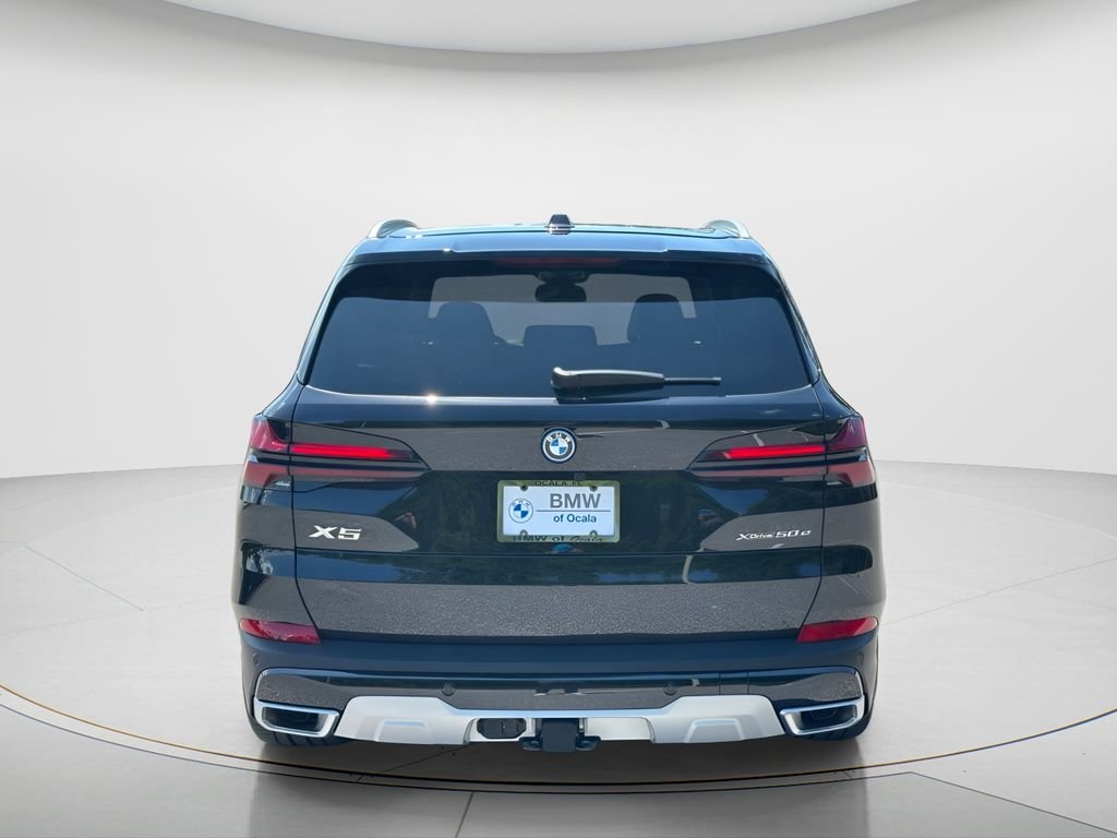New 2026 Black Sapphire Metallic BMW xDrive50e image 5