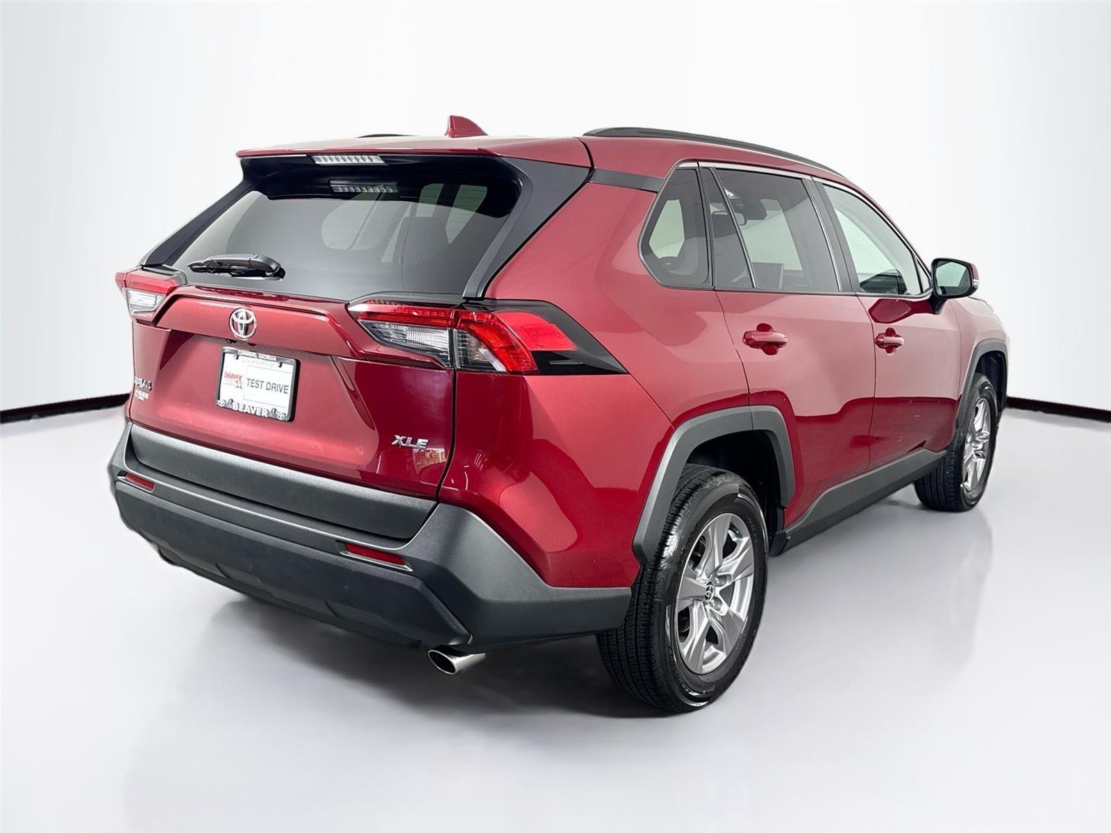Certified Used 2025 Ruby Flare Pearl Toyota XLE image 2