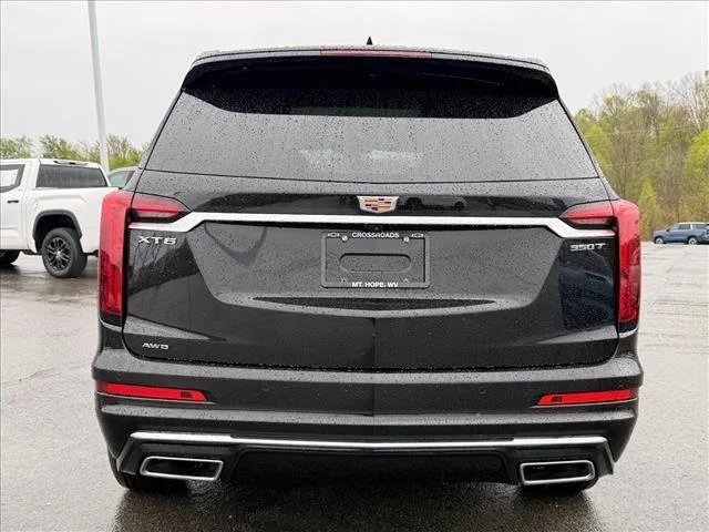 Used 2024 Stellar Black Metallic Cadillac AWD Luxury image 4