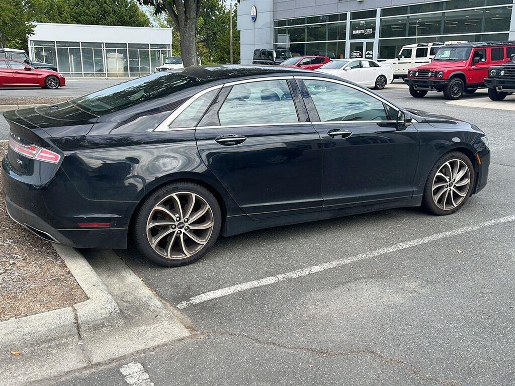 Used 2018 Black Velvet Lincoln Premiere image 3