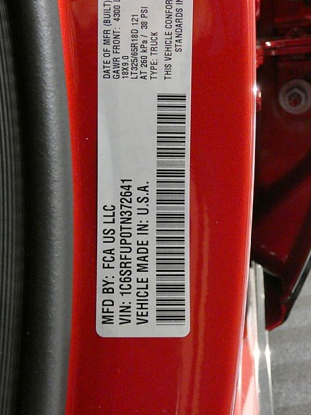 New 2026 Molten Red Pearl-Coat Exterior Paint RAM RHO 4x4 Crew Cab 5