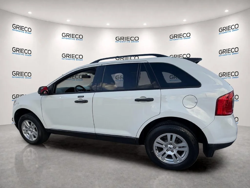 Used 2011 White Suede Ford SE image 5