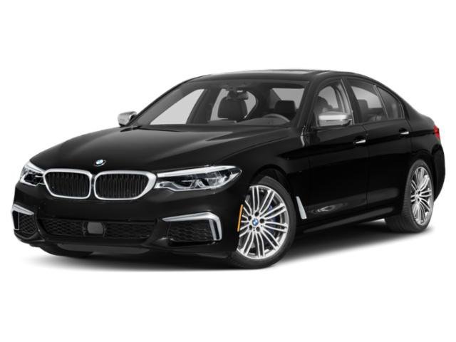 Used 2018 BLUESTONE METALLIC BMW M550i xDrive image 1
