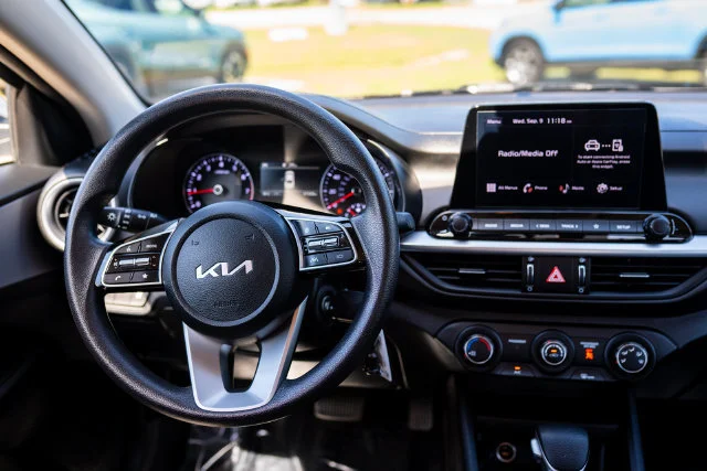 Used 2024 Snow White Pearl Kia LXS image 6