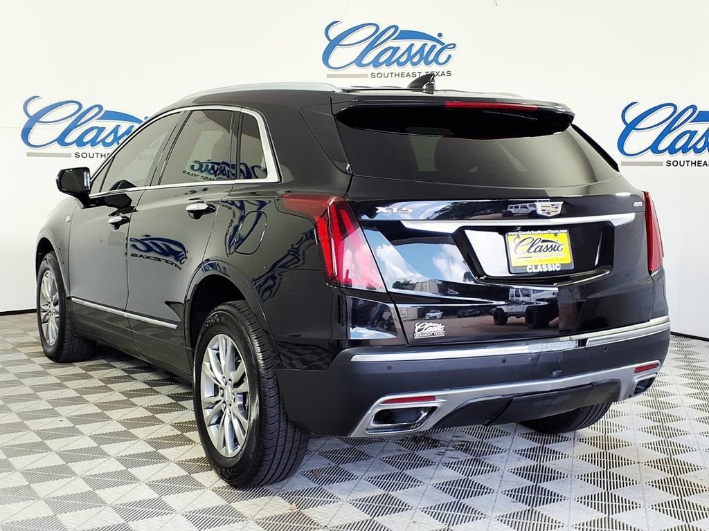 Used 2021 STELLAR BLACK METALLIC Cadillac FWD Premium Luxury image 2