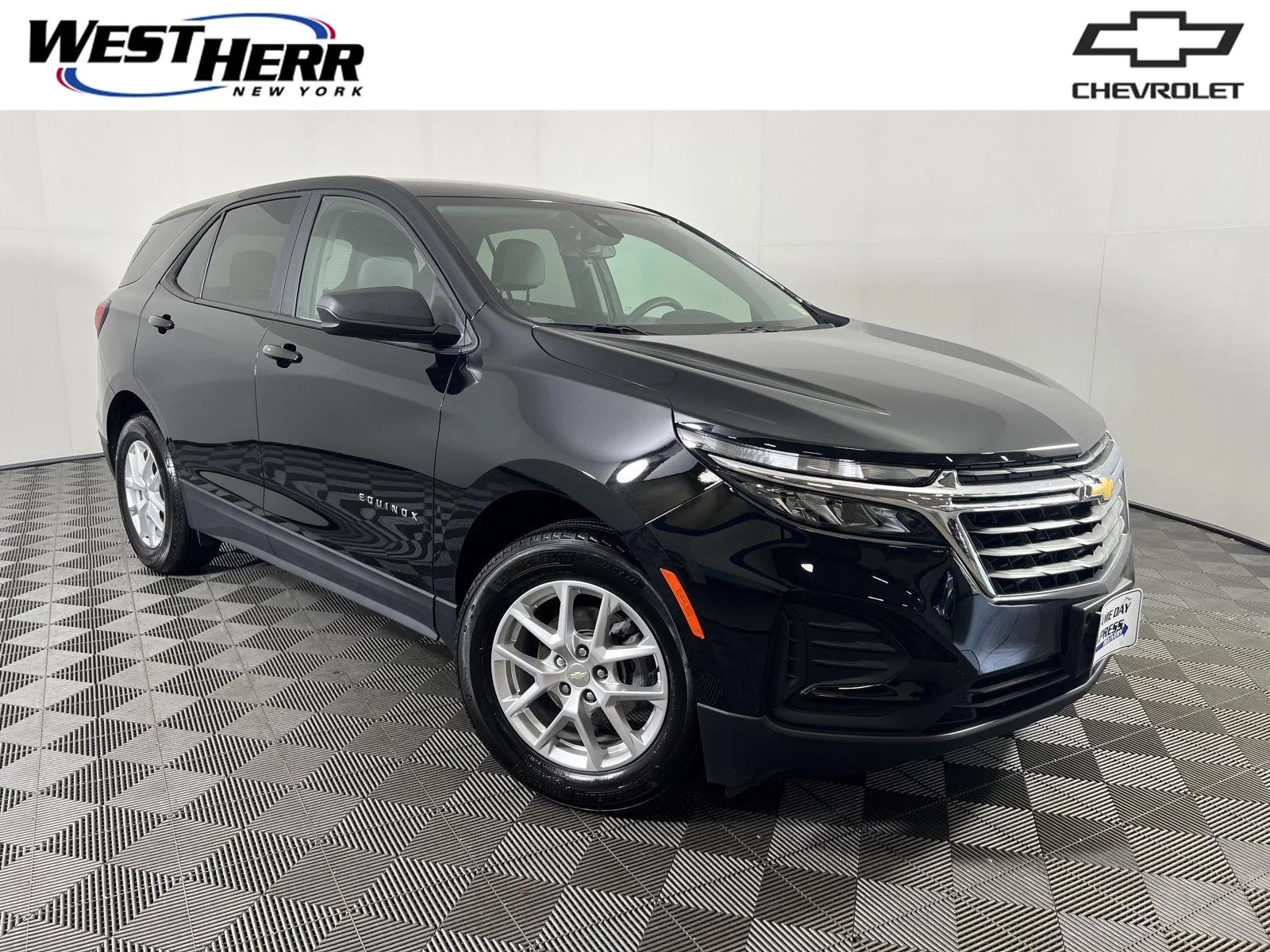 Used 2024 Mosaic Black Metallic Chevrolet LS image 1