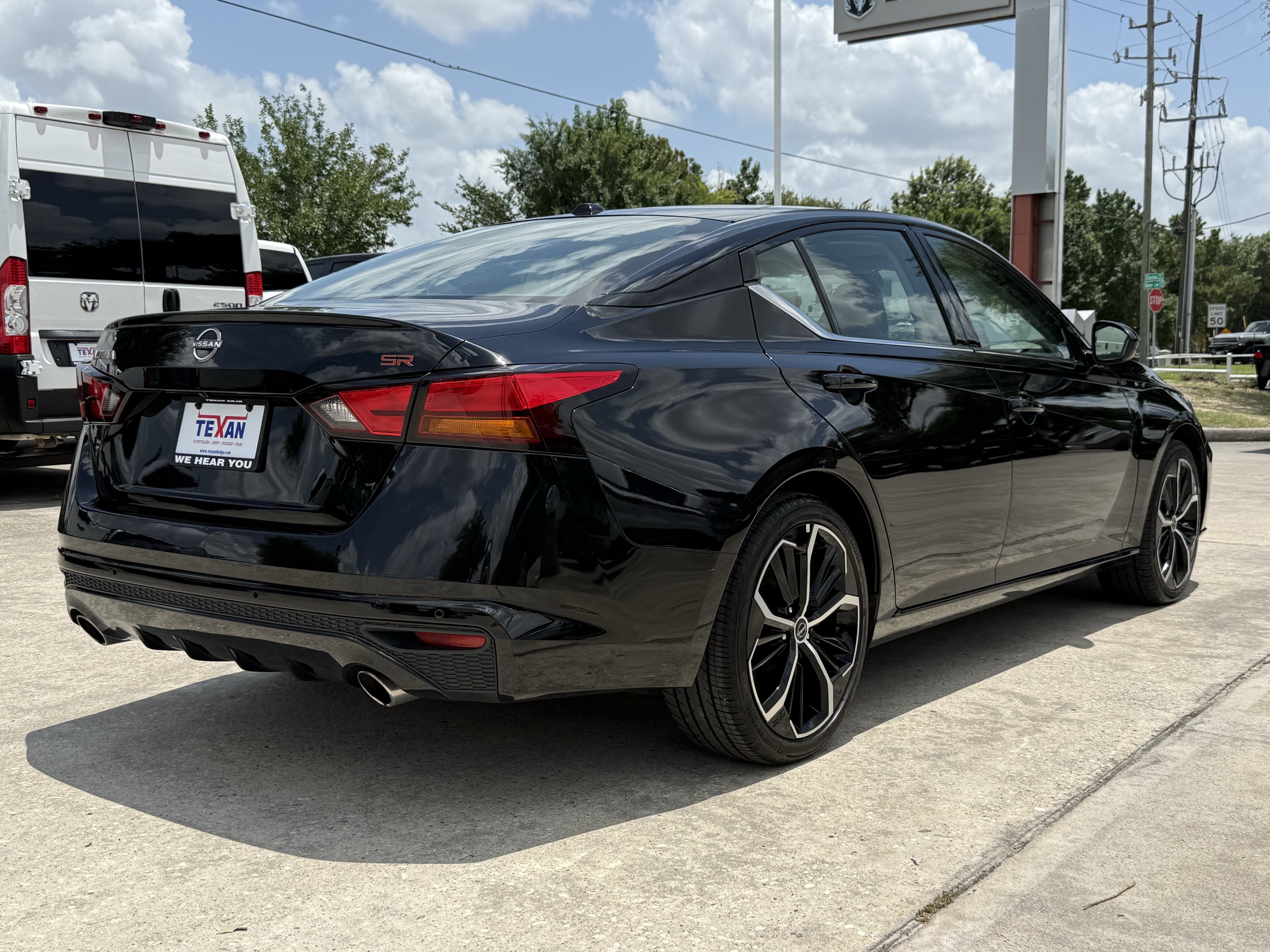 Used 2025 Super Black Nissan  image 4