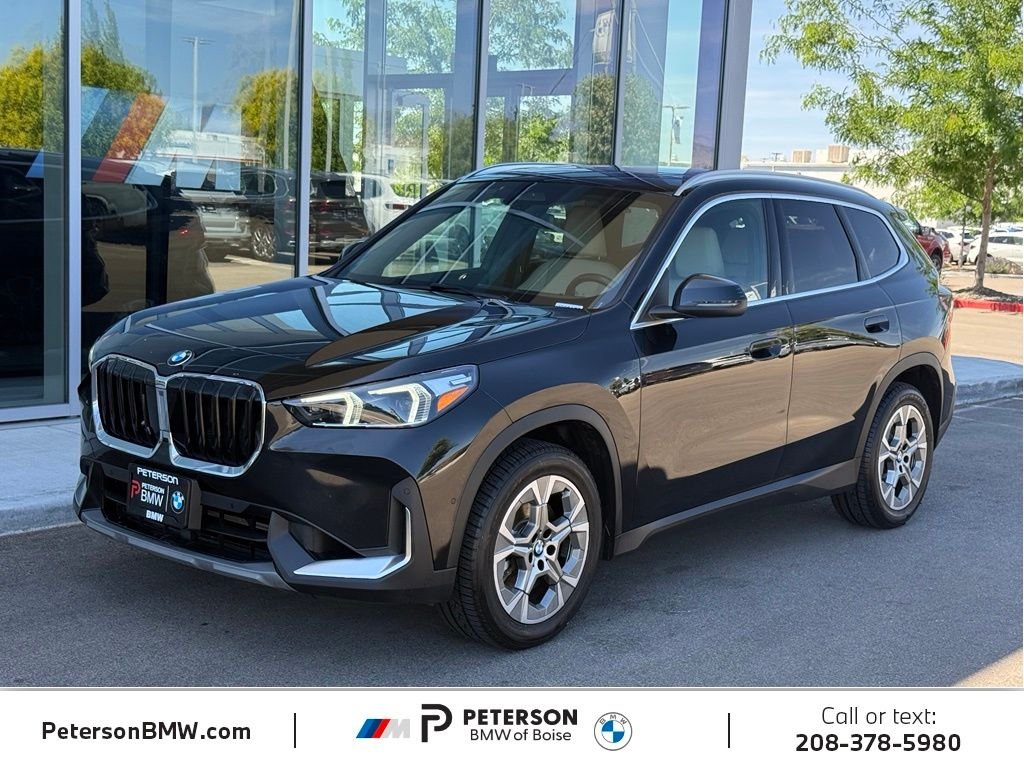 Used 2023 Black BMW xDrive28i image 1