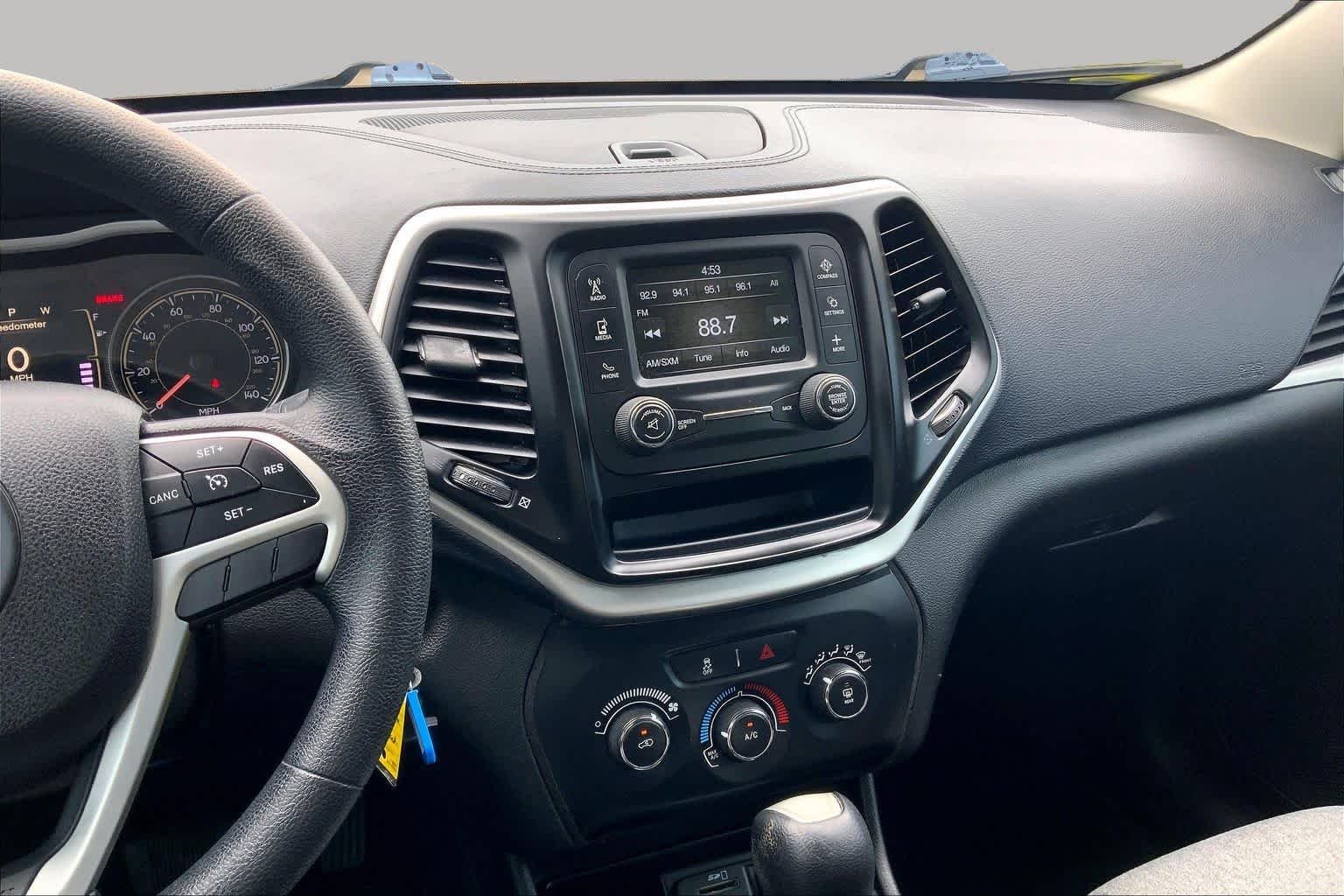 Used 2014 Brilliant Black Crystal Pearlcoat Jeep Sport image 6