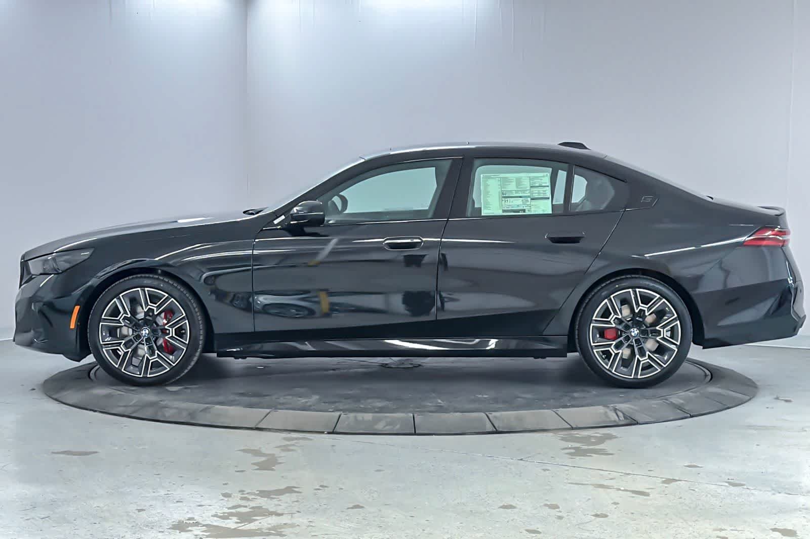 New 2027 Black Sapphire Metallic BMW 530i image 5