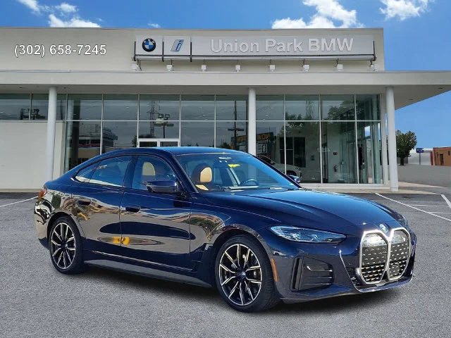 Certified Used 2022 Tanzanite Blue II Metallic BMW eDrive40 image 3