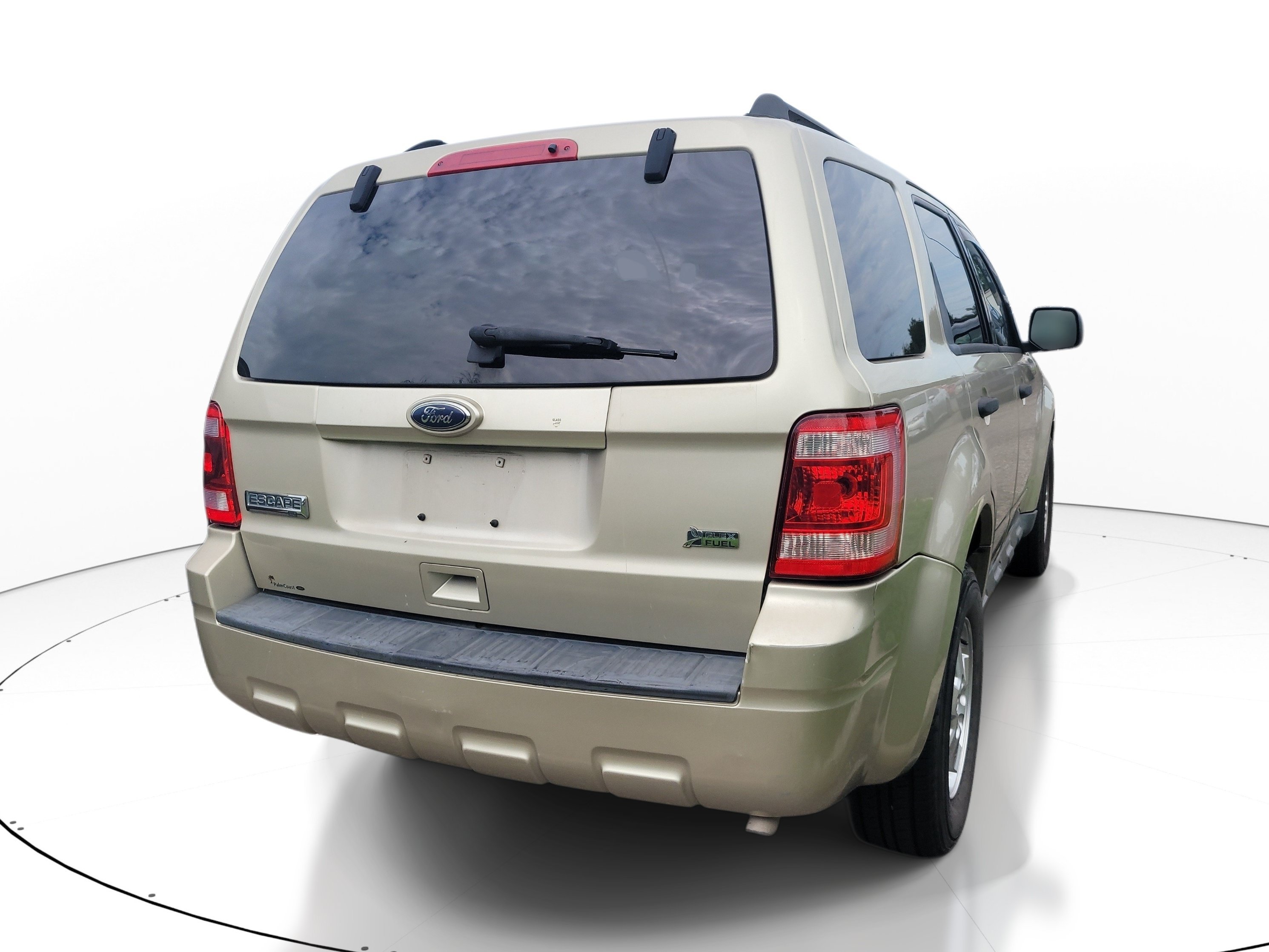 Used 2011 Gold Leaf Metallic Ford XLT image 4