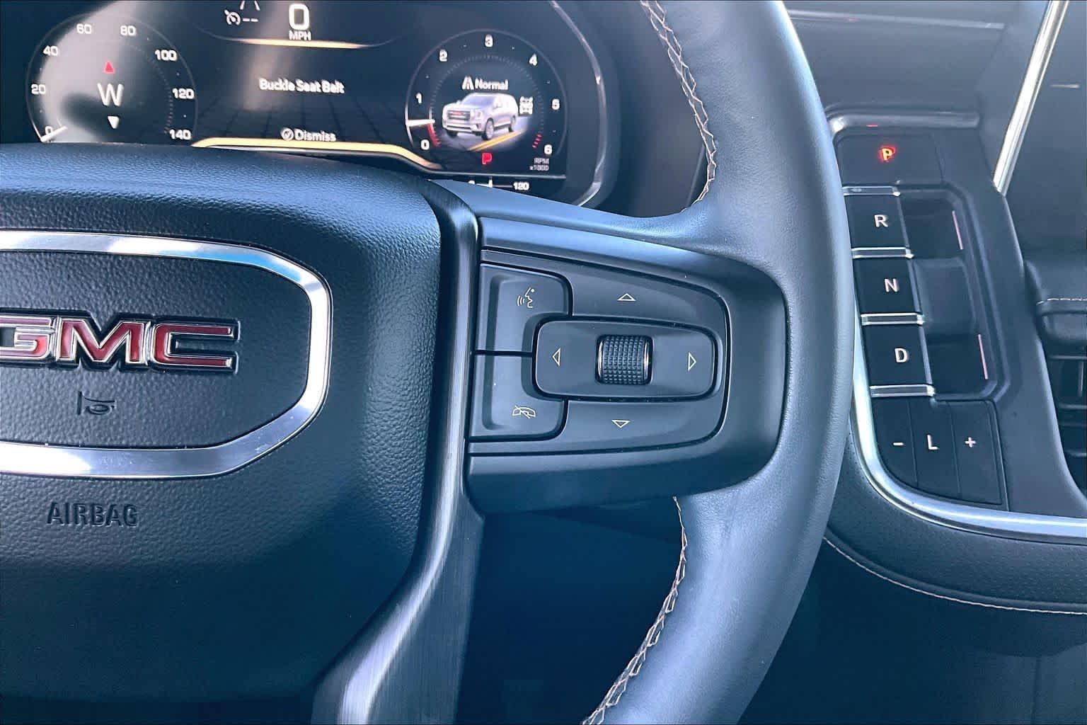 Used 2023 TITANIUM RUSH METALLIC GMC AT4 image 25