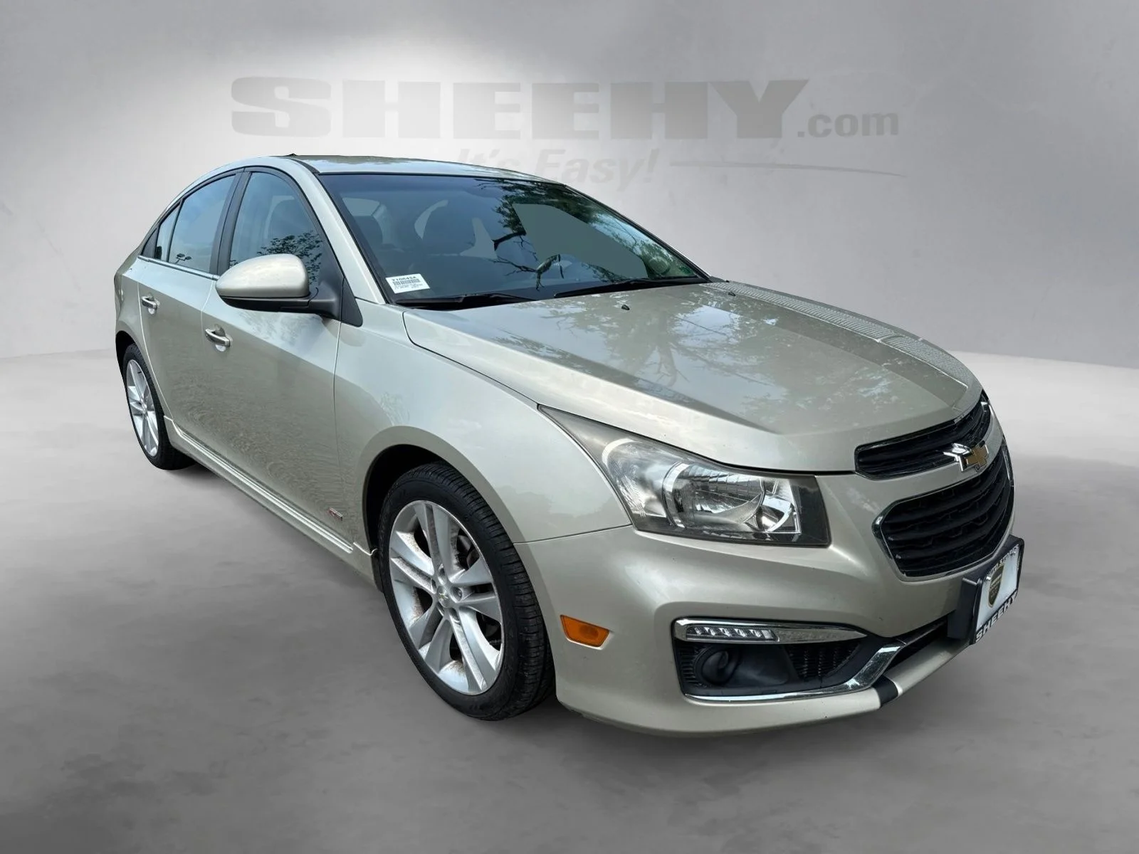 Used 2016 Champagne Silver Chevrolet LTZ image 2