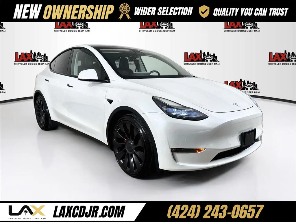 Used 2022 Yellow Tesla Performance image 1