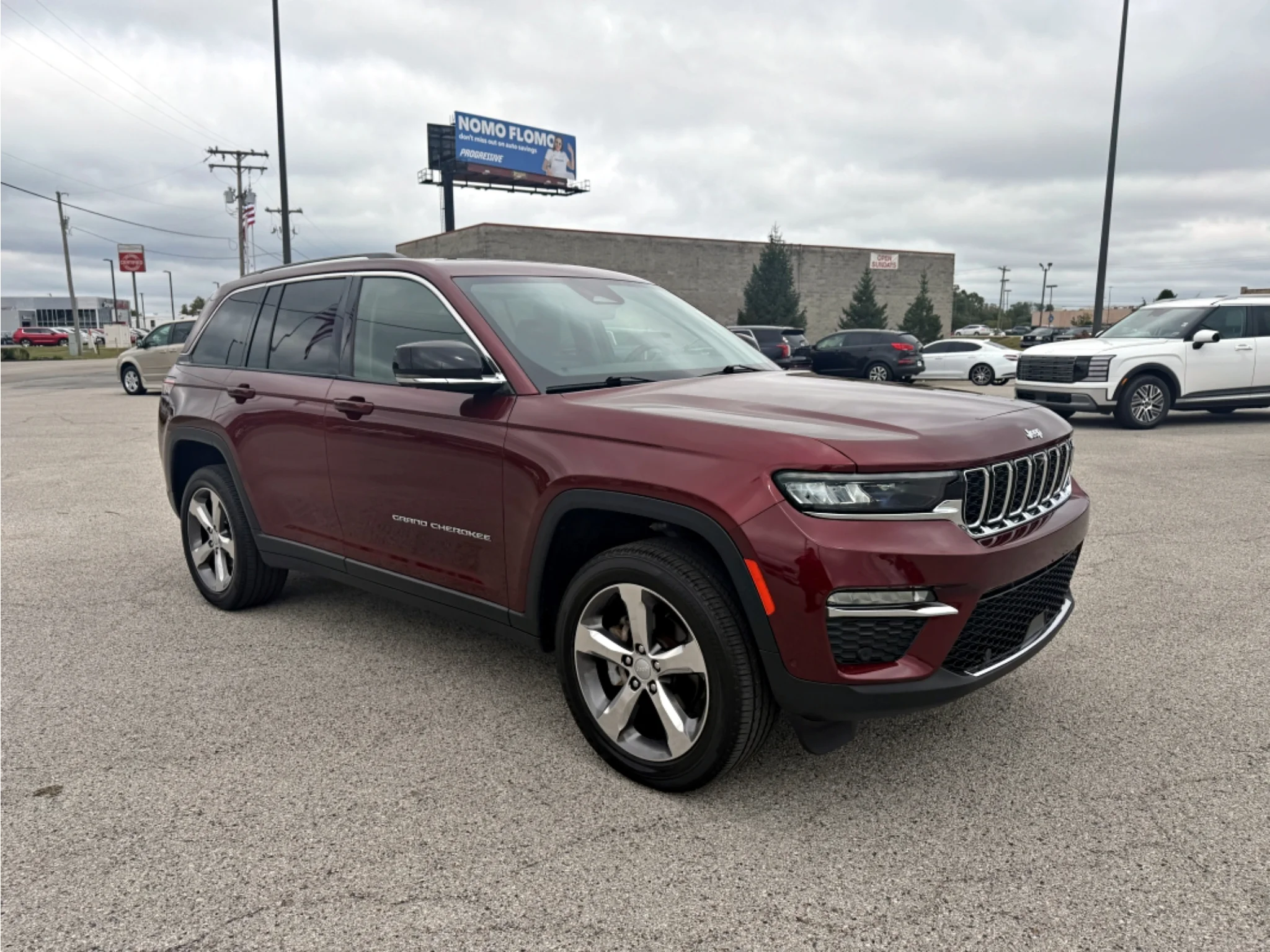 Used 2022 Velvet Red Pearl Jeep Limited image 4