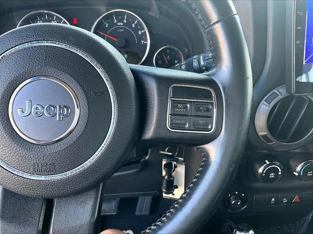 Used 2014 Beige Jeep Unlimited Sport image 17