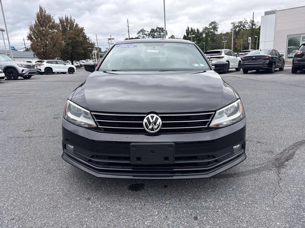 Used 2016 Black Uni Volkswagen 1.8T Sport image 4
