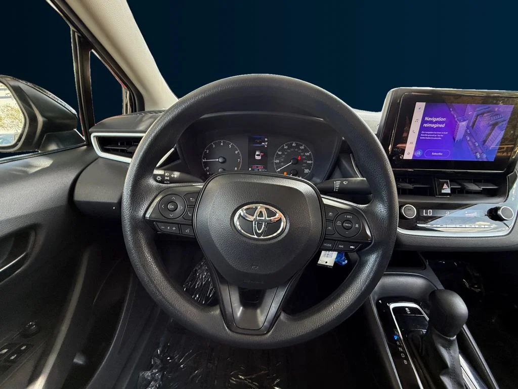 Used 2024 Black Toyota LE image 13