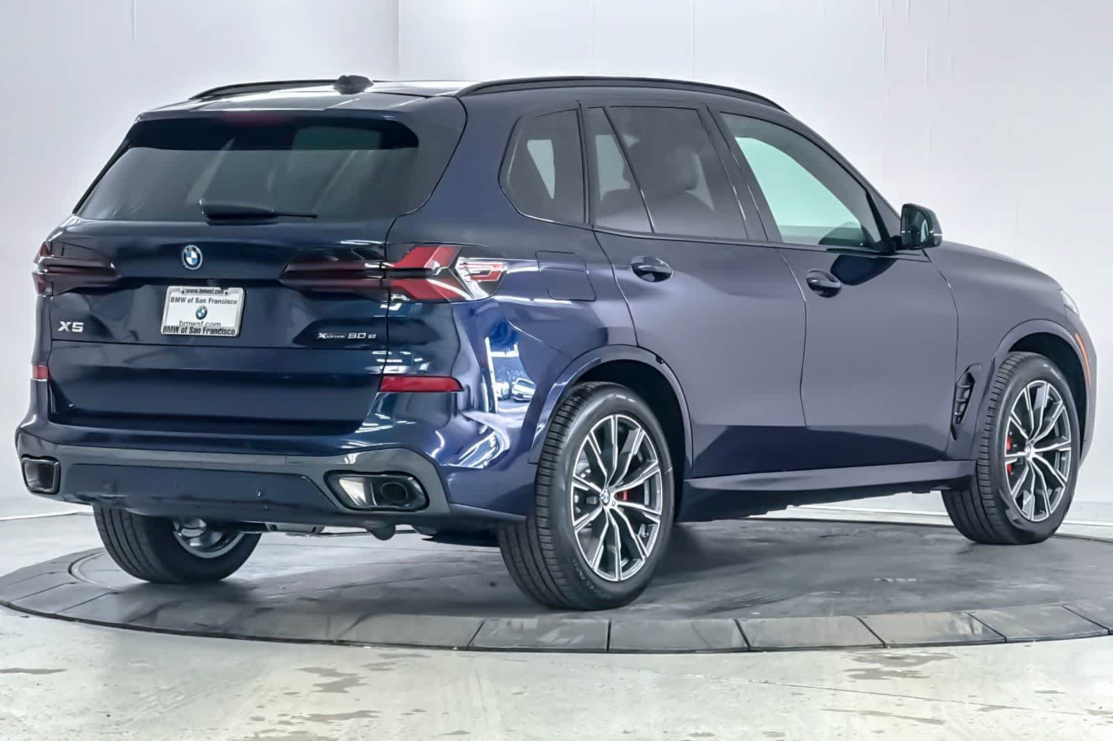 New 2026 Tanzanite Blue II Metallic BMW xDrive50e image 2