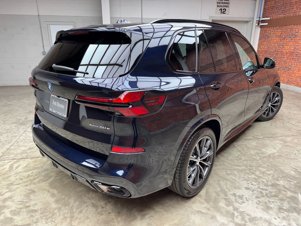 New 2026 Black BMW xDrive50e image 6