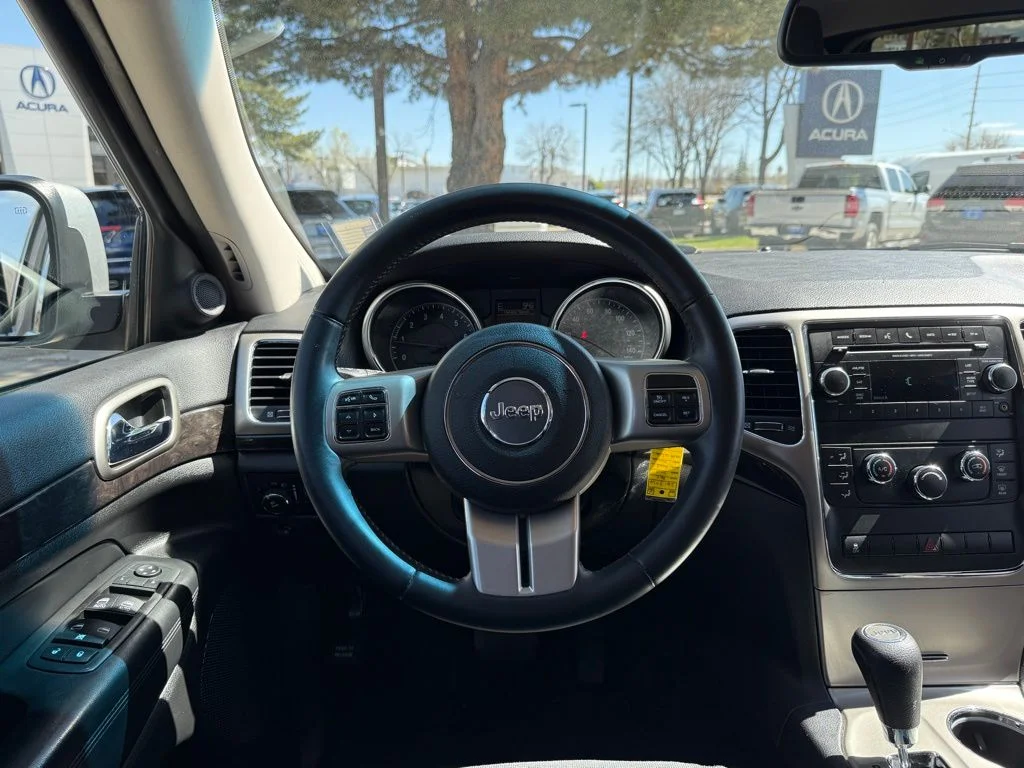 Used 2012 Jeep Grand Cherokee Laredo with VIN 1C4RJFAG2CC270398 for sale in Boulder, CO