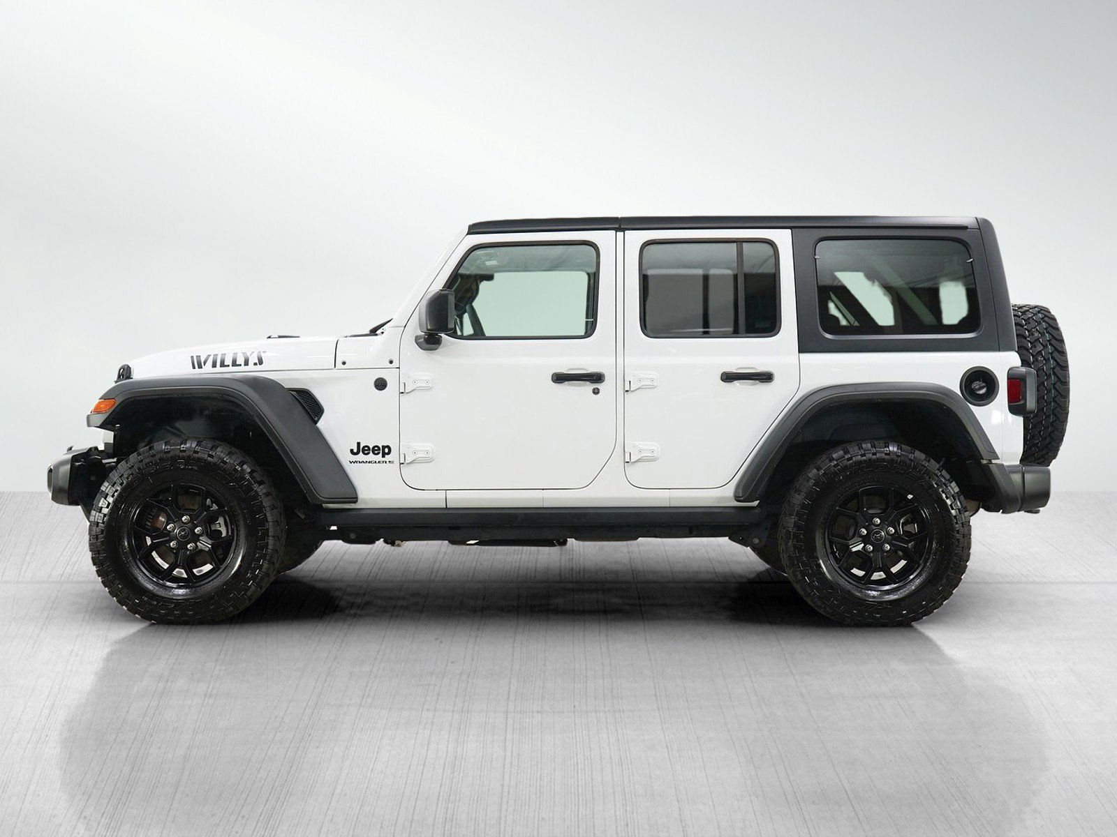 Used 2025 Jeep Wrangler 4-Door Willys with VIN 1C4PJXDN0SW597421 for sale in Minneapolis, Minnesota